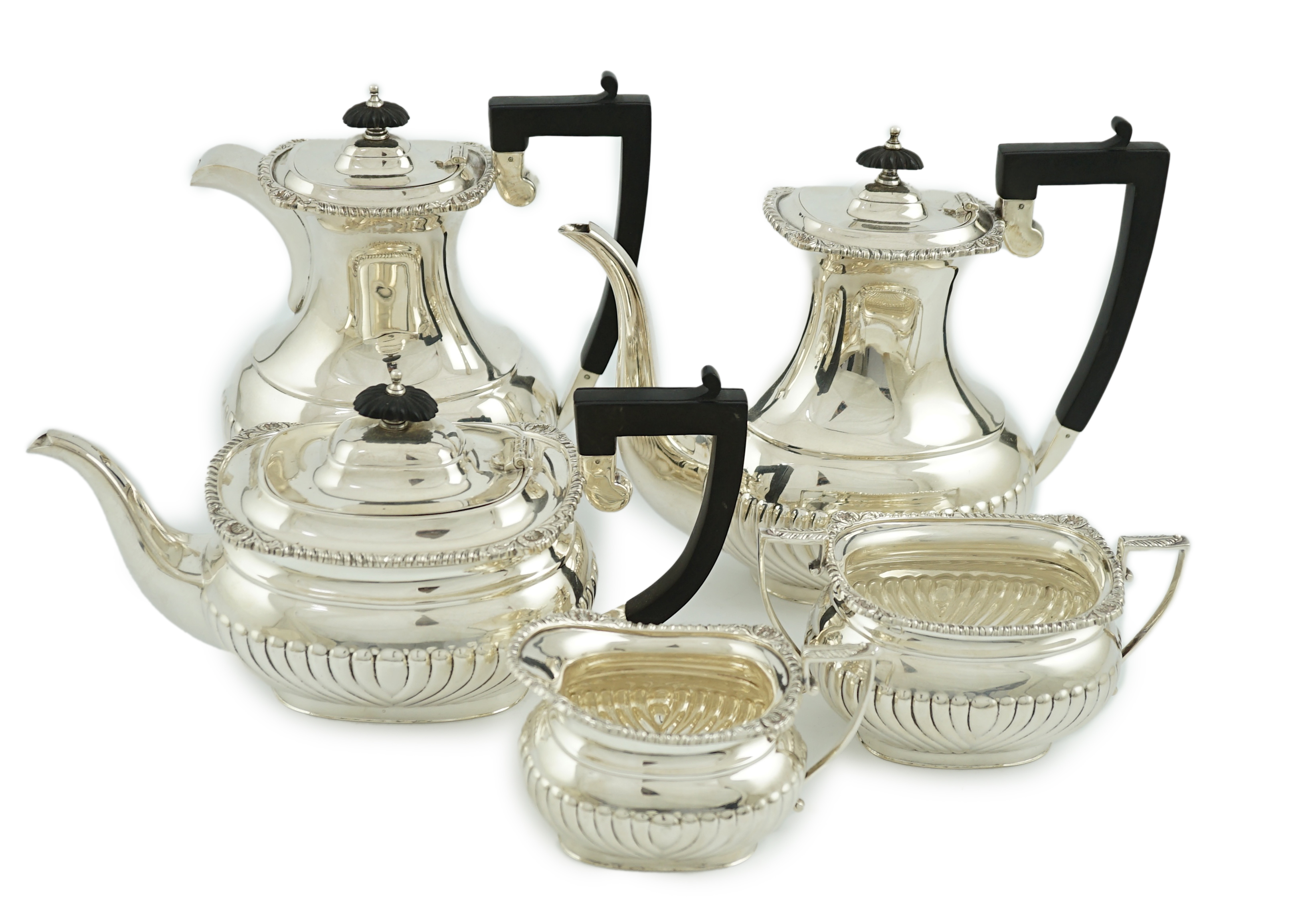 An Elizabeth II five piece demi-fluted silver tea service, by Roberts & Belk